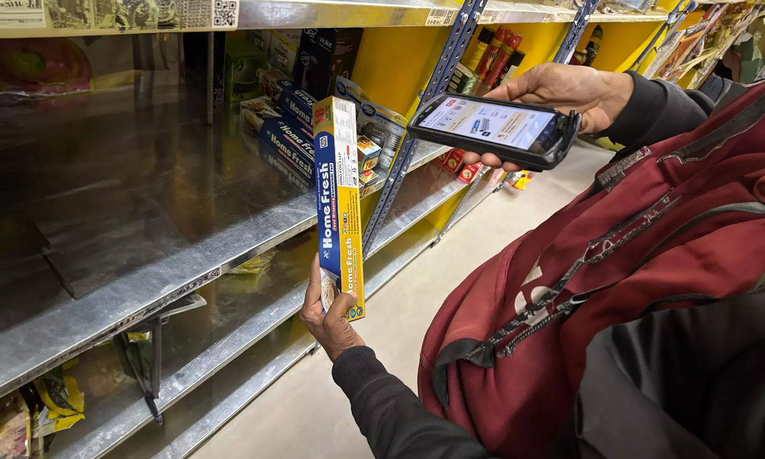 Dark store picker scanning the barcode of the product